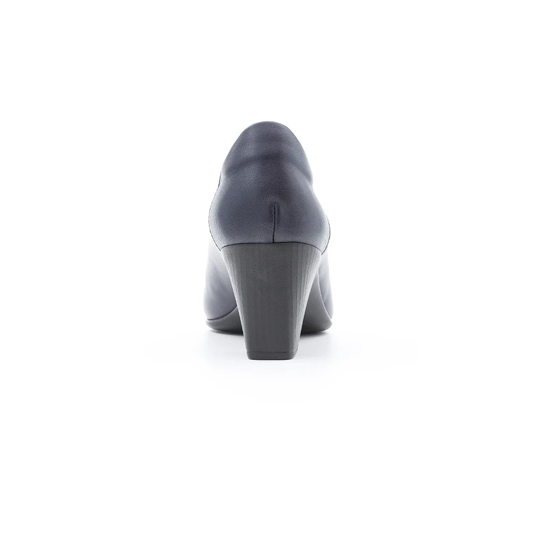 Women’s orthopedic navy court shoes for office wear and formal occasions.