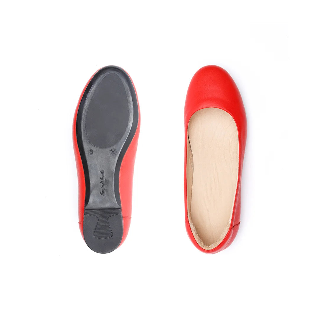Red orthopedic slip-on shoes for women with wide fit and seamless interior for sensitive feet.
