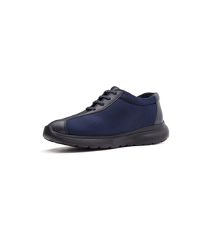 Navy 611-06-UNI lace-up shoe with side panels, viewed from the opposite front angle.