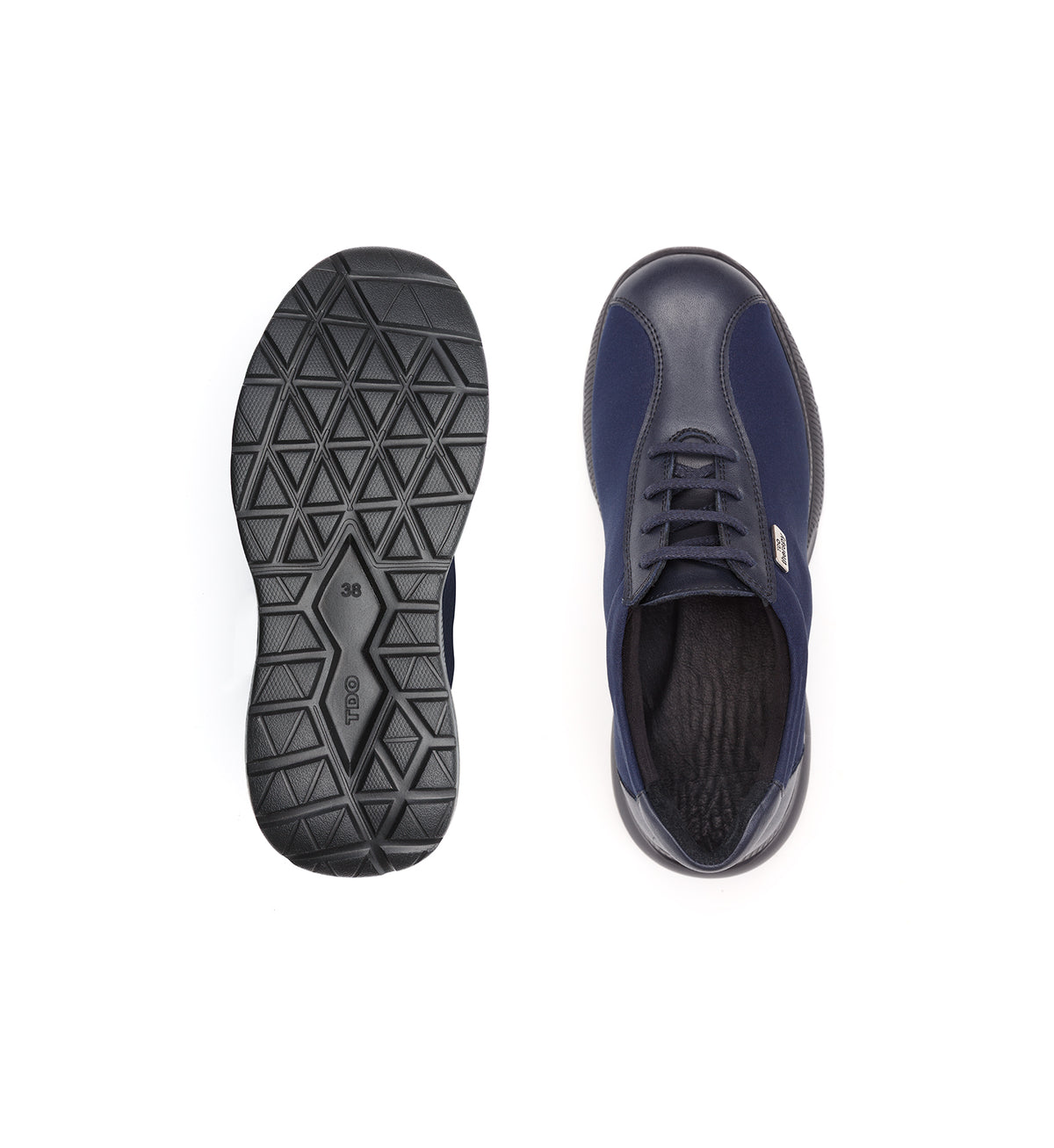 Top and sole views of the navy 611-06-UNI lace-up shoe with side panels.