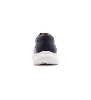 Navy 611-UNI lace-up shoe with a white sole, rear view.