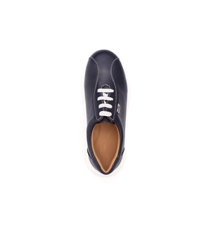 Navy 611-UNI lace-up shoe with a white sole, top view.