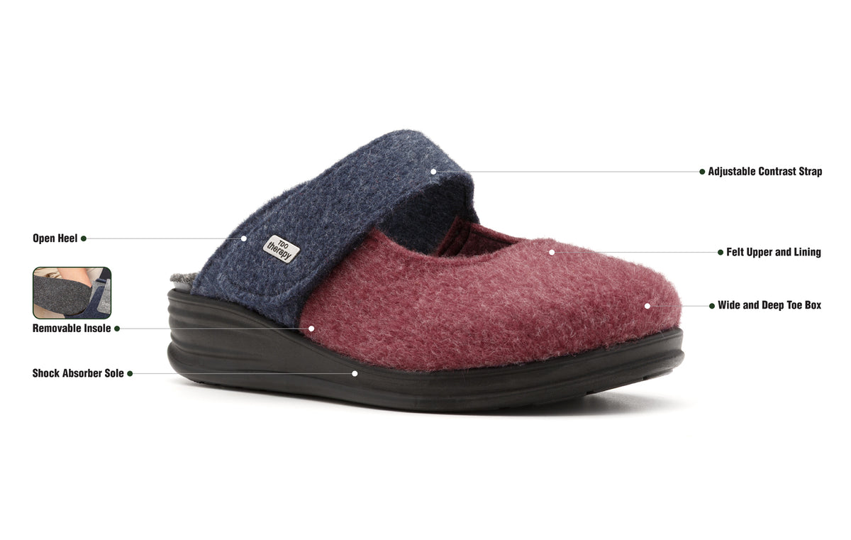 Burgundy and navy Amberley felt slipper with labelled product features.