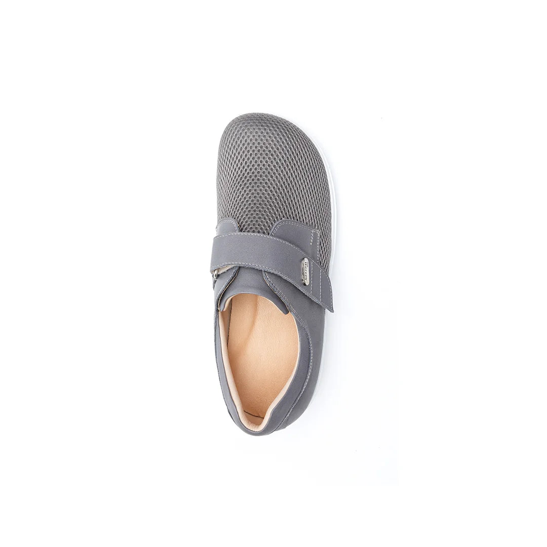 Supportive orthopedic shoes designed for elderly men needing comfort and stability