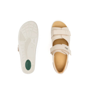 Top and outsole views of the beige Cove women’s wide fit orthopedic sandal.