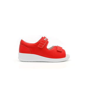 Side view of the red Cove women’s EEE wide fit orthopedic sandal with a cushioned white sole.