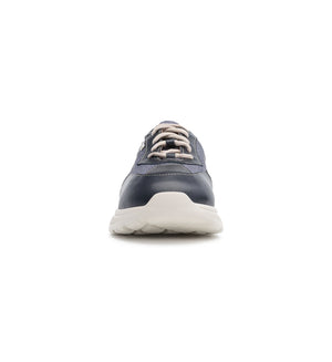 Front view of the Flex Air navy trainer showing its wide and deep toe shape