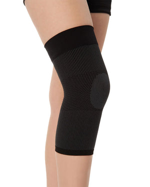 Knee support compression sleeve providing stability and pain relief for weak or injured knees