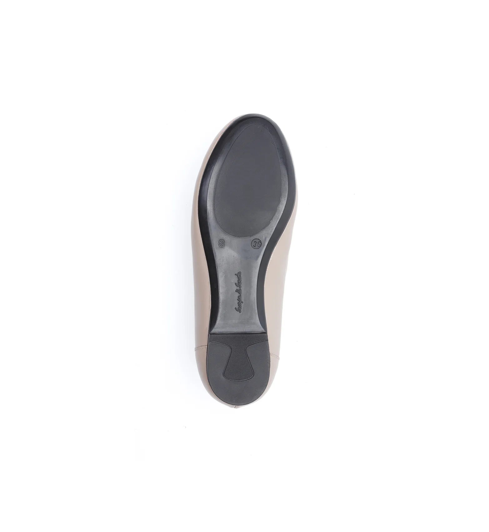 Women's beige flat shoes with a supportive sole.