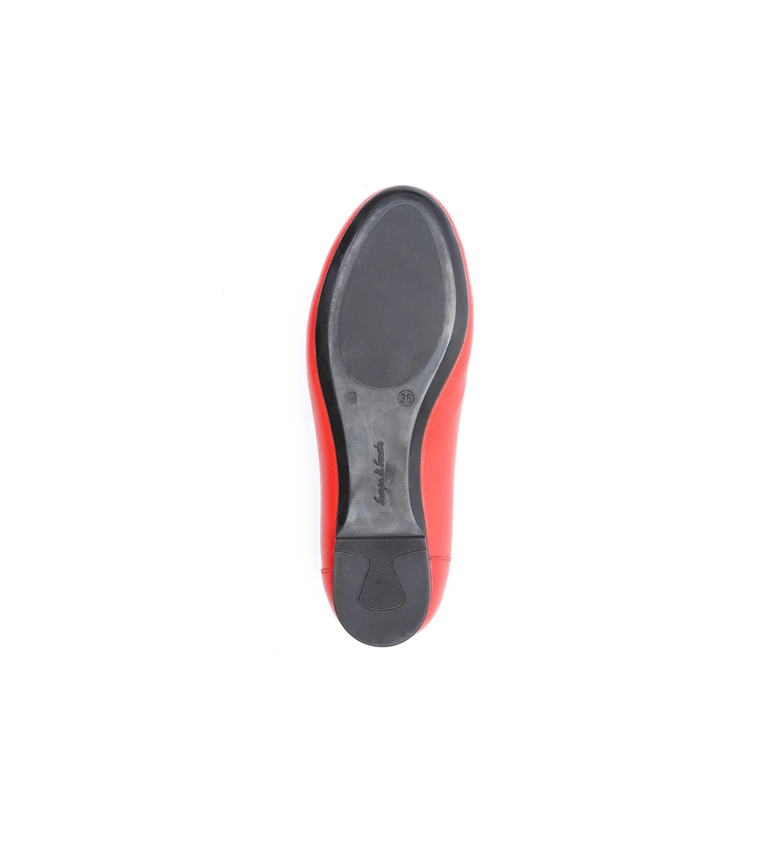 Women's red flat shoes with a supportive sole.
