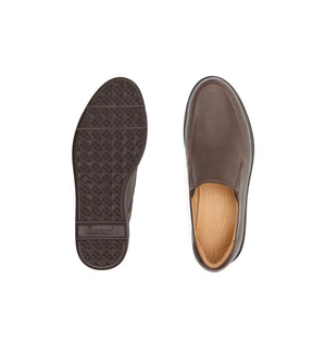 Men's brown slip on shoes shown with a supportive sole.