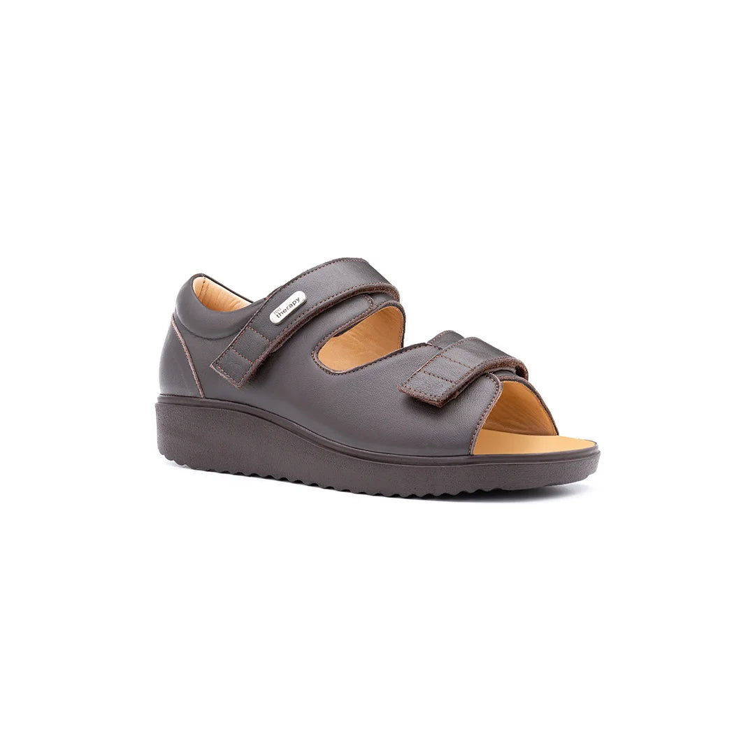 Mobility-support sandals for women with rocker soles and cushioned interior.