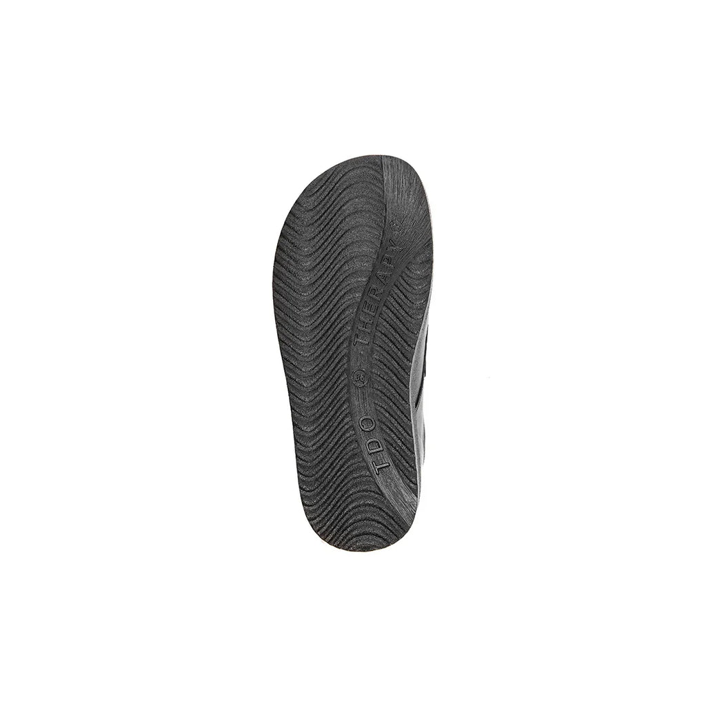 Bottom view of the sole of TDO 615.20-UNI Wide Fit Orthopaedic Diabetic Shoes, highlighting their supportive and comfortable construction.